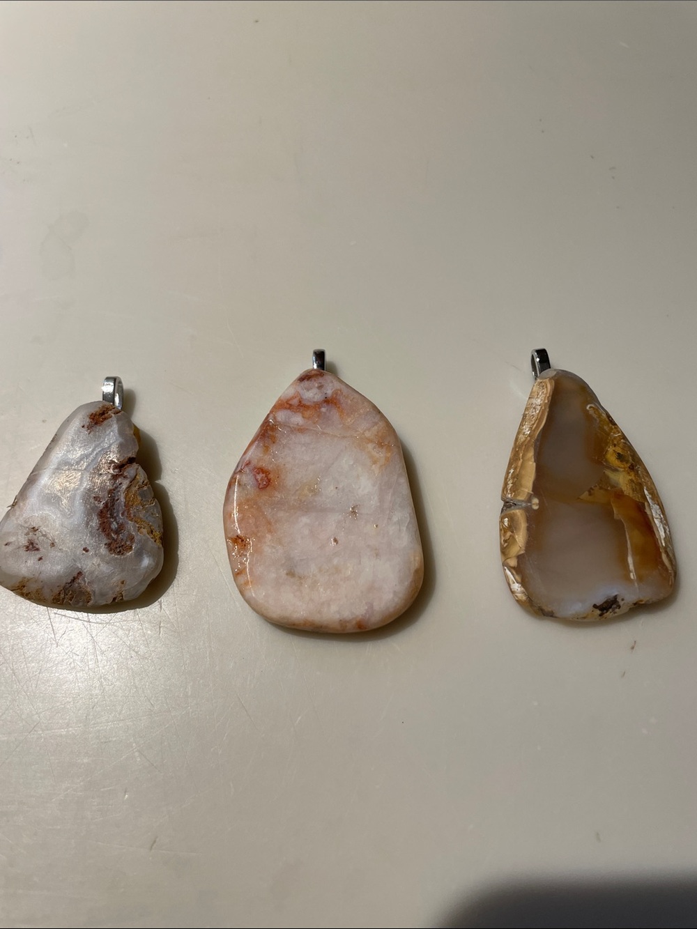 3 Ancient agates mined in Panama with bales ready for stringing